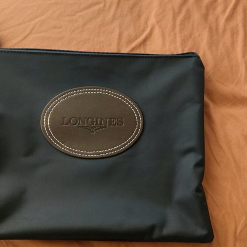 Longines purse used handheld 100% original