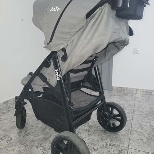 Joie Baby Stroller used with cup holders and waterproof hood