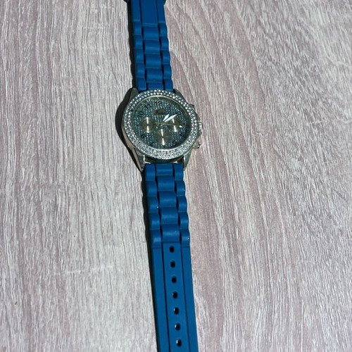 Watch like new with blue plastic and elastic strap