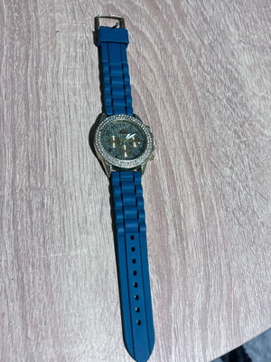 Watch like new with blue plastic and elastic strap