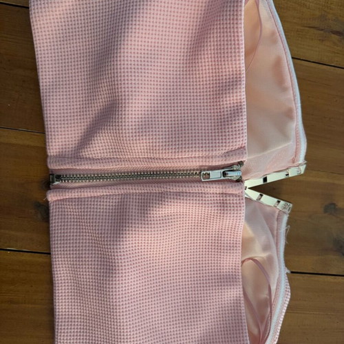 Pink bustier with gold detail and zipper, size small