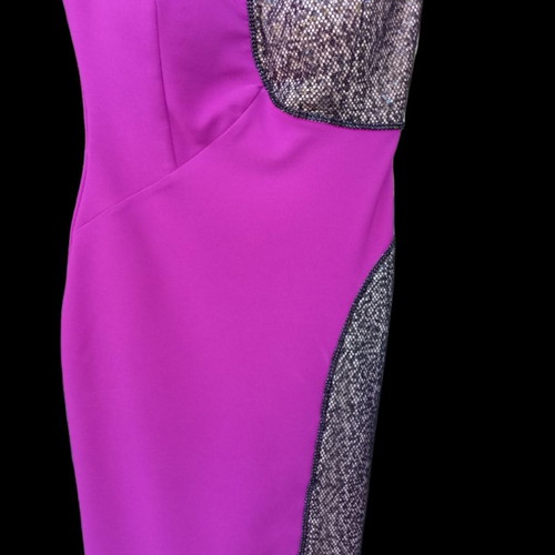 Cocktail dress new, elastic with embroidered details, size S