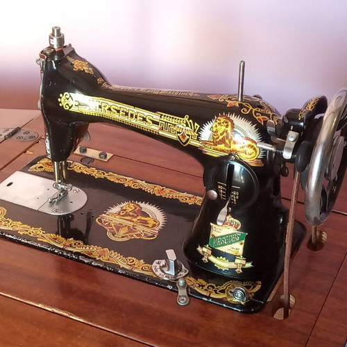 Mrsedes sewing machine used with antique furniture