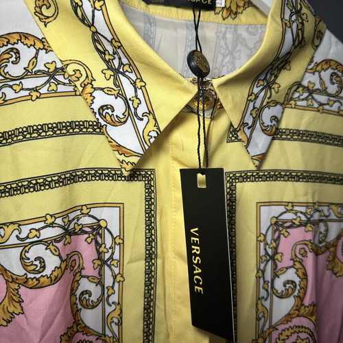 Versace women's dress new, colorful, size 2XL fitting L