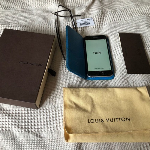 Iphone 6 used unlocked with authentic Louis Vuitton leather case, cable and silicone cover