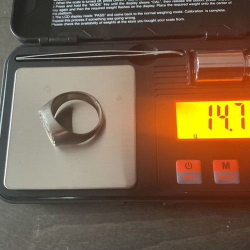 Men's metal ring used with signs of wear