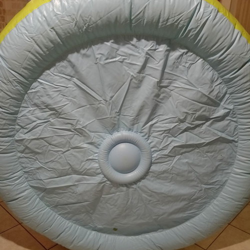 Inflatable colorful playpen used with balls and slides