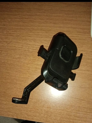 Mobile phone holder like new, metal support and plastic base