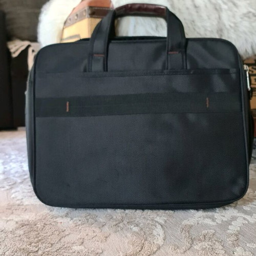 Ormi briefcase like new, hand and shoulder, black-brown