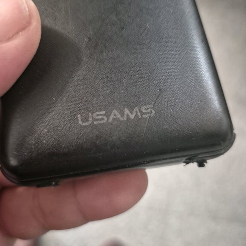 USAMS Power Bank 10,000mAh used with digital display and built-in cables
