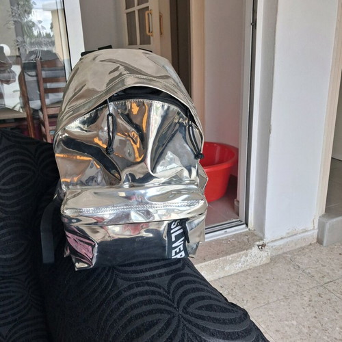 City Mirror Effect Backpack like new, silver by Lyc Sac