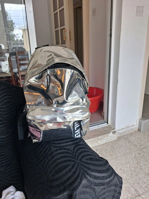 City Mirror Effect Backpack like new, silver by Lyc Sac