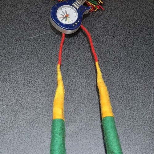Vintage Table Clock Rastaman Figurine with Guitar like new