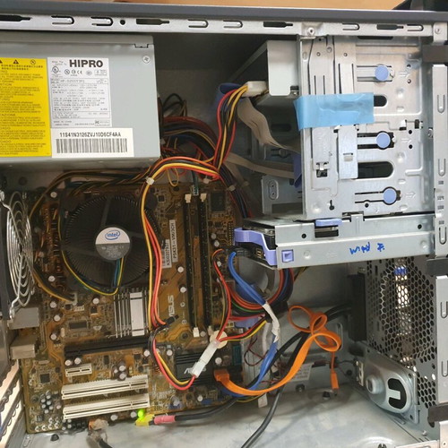 Lenovo desktop computer used with Windows 10, monitor, keyboard, and mouse