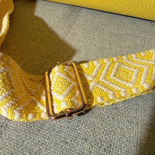 Yellow shoulder bag like new with strap and silver details