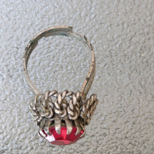 Old ring used, gray with red stone