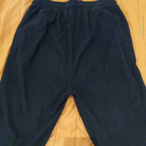 Velvet women's pants used, size L, black with pockets and elastic cuffs