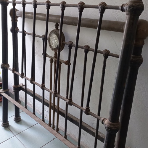 Solid iron bed with brass decorations used