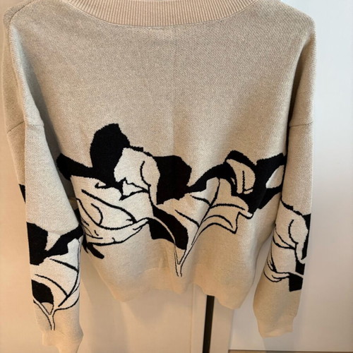 Ivory cardigan with patterns size medium new