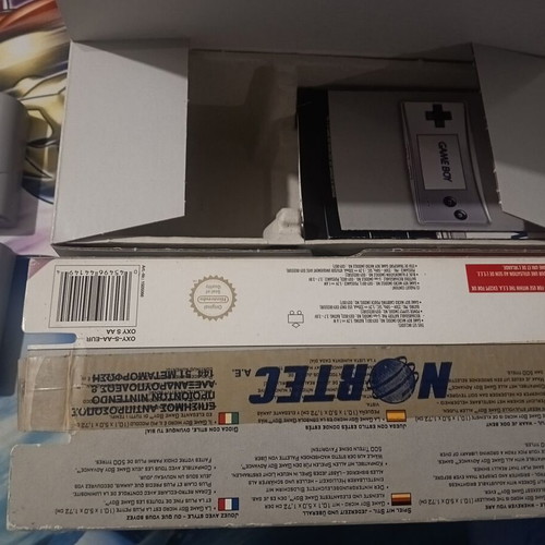 Game Boy Micro like new with 3 games, original packaging and charger