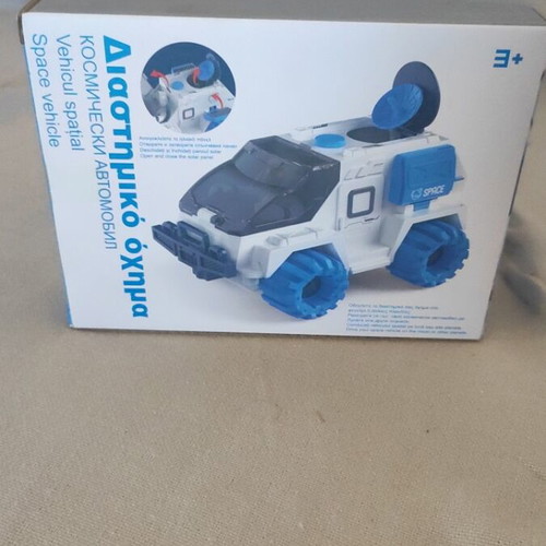 Space vehicle with two astronauts toy