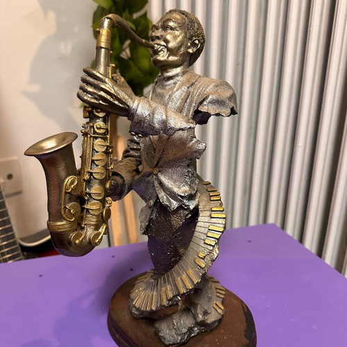 Vintage Jazz Saxophonist Figurine on Wooden Base like new