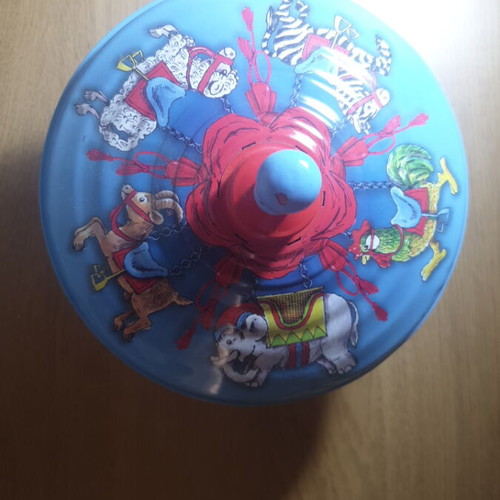 Metal spinning top like new with circus animal design