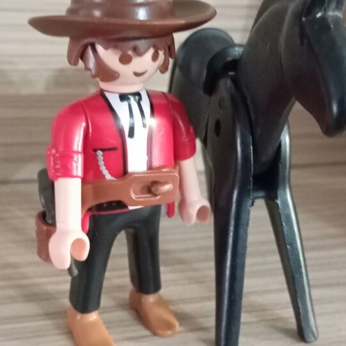Playmobil cowboy with horse used