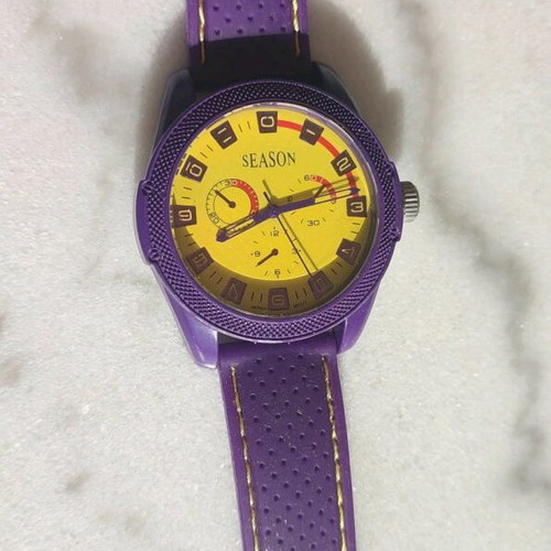 Season Time women's watch new with purple strap and yellow dial