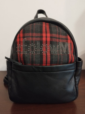 Migato women's backpack like new, black with plaid details, 100% PU