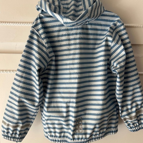 Children's waterproof jacket like new for 5-6 years with removable hood