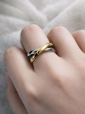 Three-ring ring like new, black and gold tones