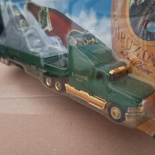 Truck - Articulated lorry in H0 scale - beer advertisement with bottle and ice mountain - Kapuziner