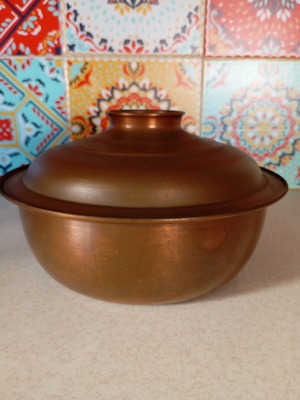 Cast iron and copper cooking vessel used, 24cm diameter, 14.5cm height with lid