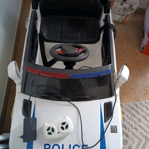 Children's police toy car like new with charger and remote control