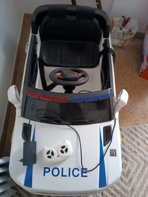 Children's police toy car like new with charger and remote control
