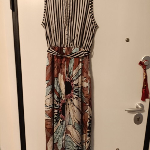 Women's long maxi dress with striped top and floral skirt