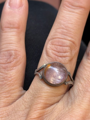 Ring made of black silver with large opal stone