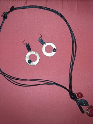 Jewelry set like new with leather cord and stones necklace and earrings
