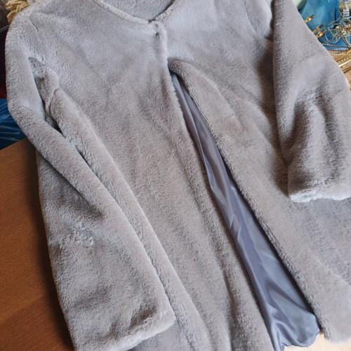 Gray faux fur coat used with soft fur and central button