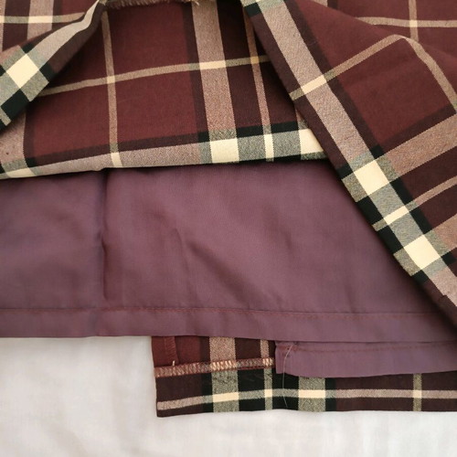 Checked skirt used, size M, quality fabric