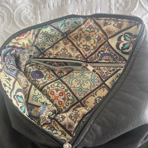 Leather backpack used with inner lining and fabric straps