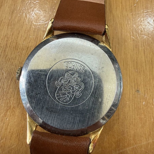 Technos wind-up watch like new, unisex, gold color