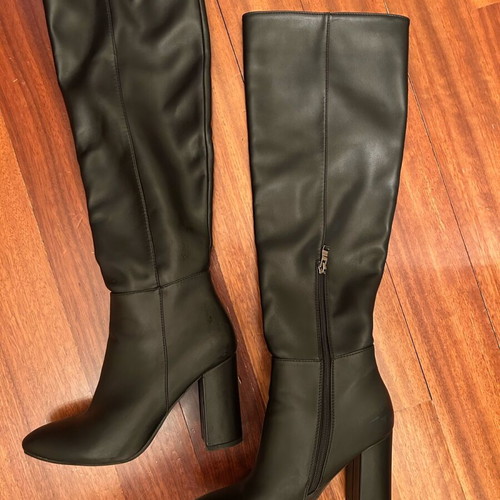 Black high boots made of smooth synthetic leather like new, size 38