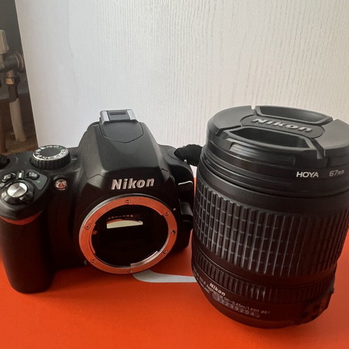 Nikon D60 camera kit used with 18-105mm VR lens, 2 batteries, cards, bag
