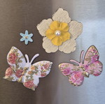 Set of 4 embossed fridge magnets