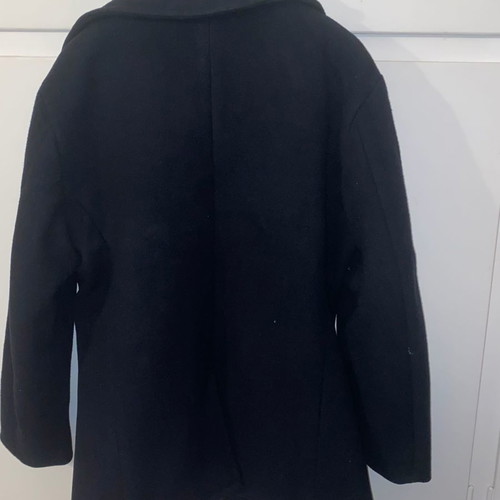 Navy coat authentic with collectible buttons from 1998