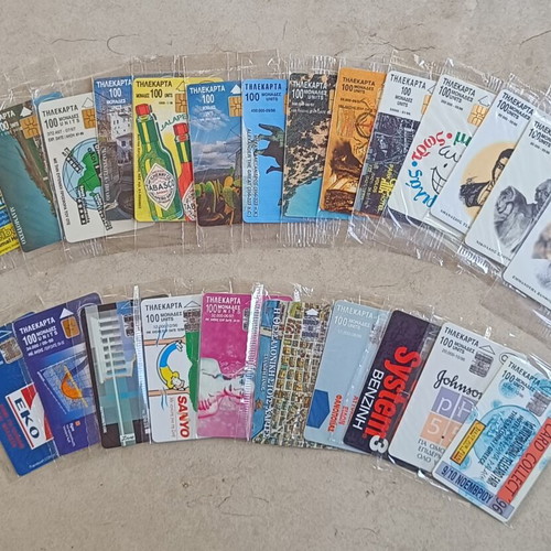 Phone cards pack of 128 sealed, all different