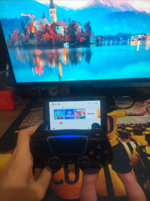 Nintendo Switch console with controller used