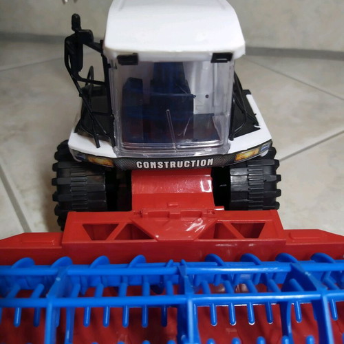 Harvester toy used with trailer